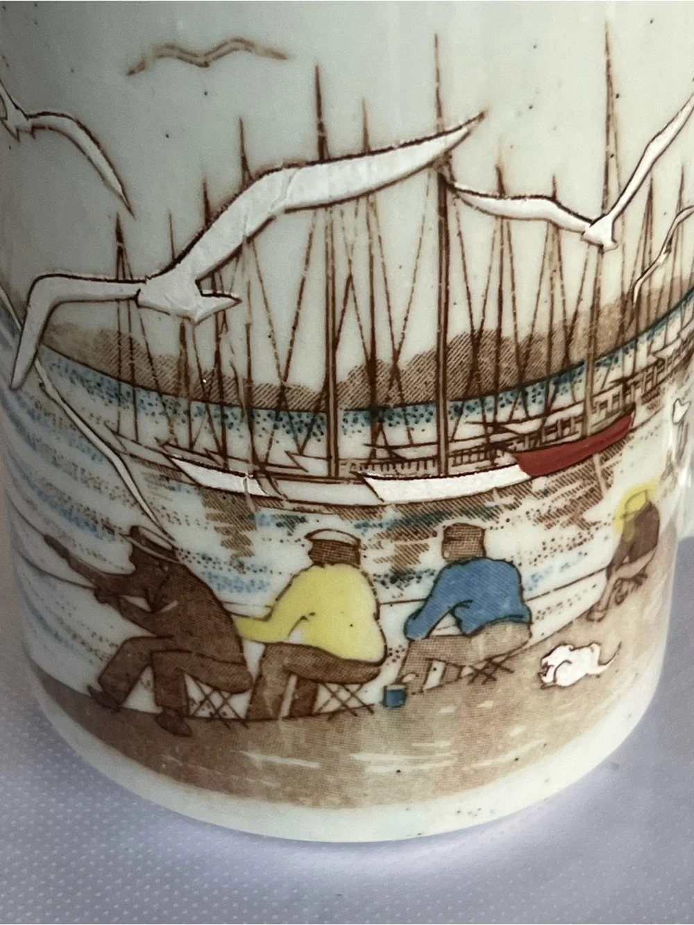 Seaside Fishermen Ceramic Art Piece in Blue, Yellow and Brown